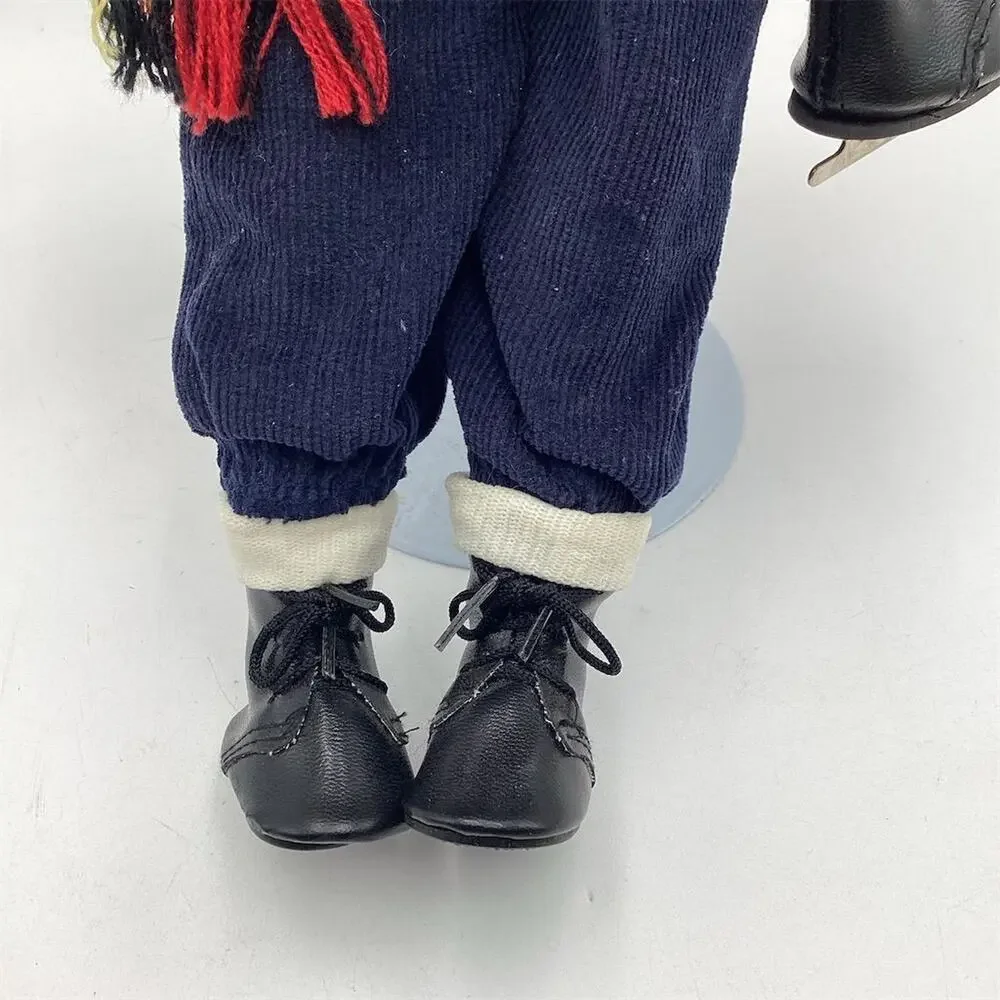A Vintage Porcelain Boy Doll 16”with Ice Skates‎ Winter Theme